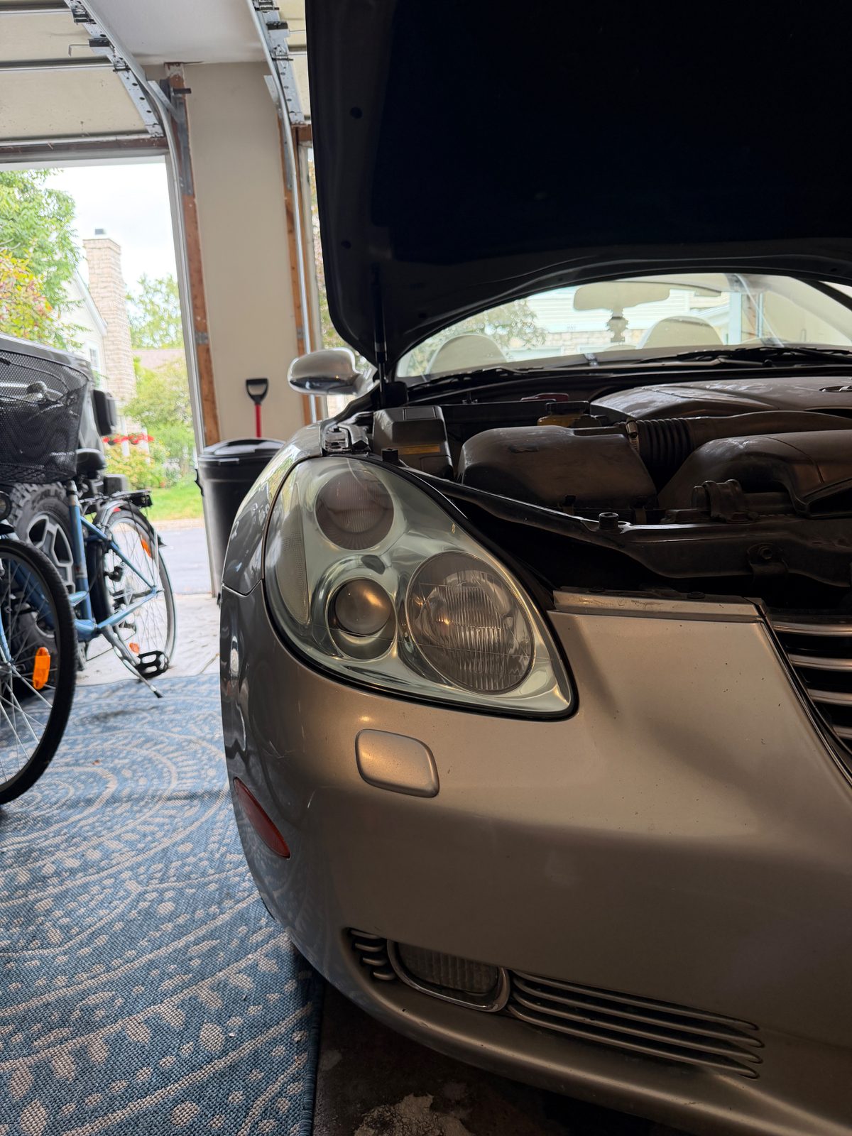 Yellowed headlight restored to clear on a silver Chrysler in Columbus, Ohio after restoration